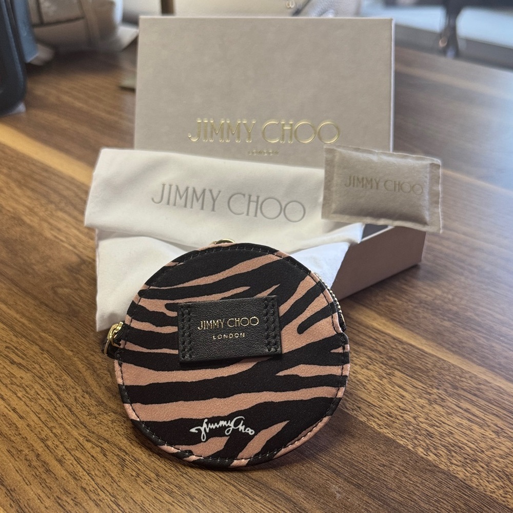 Jimmy Choo Black and Tan Round Coin Pouch Full Inclusion